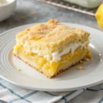 A delicious plate of 4-Ingredient Lemon Cream Cheese Dump Cake 🍋