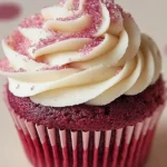 A delicious plate of Pink Velvet Cupcakes with Vanilla Buttercream Frosting