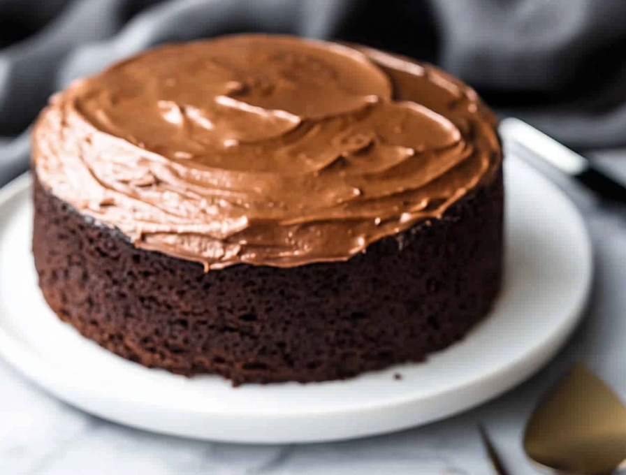 A delicious plate of Chocolate Cake with Chocolate Frosting